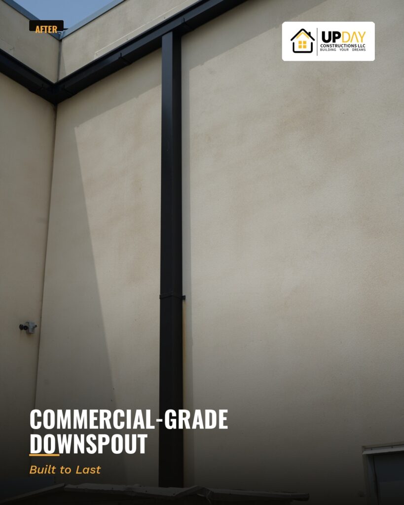 New black aluminum commercial-grade downspout installed at The Shops at Legacy East, Plano, TX