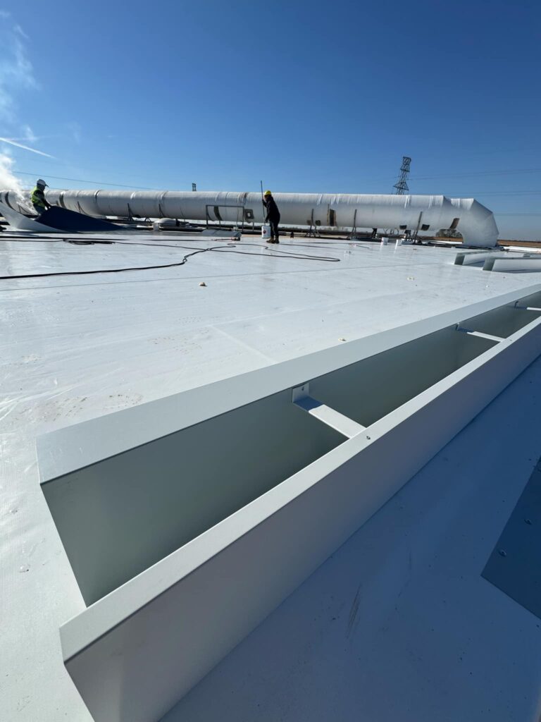 Industrial-scale box gutter system overview on commercial rooftop – UpDay Constructions